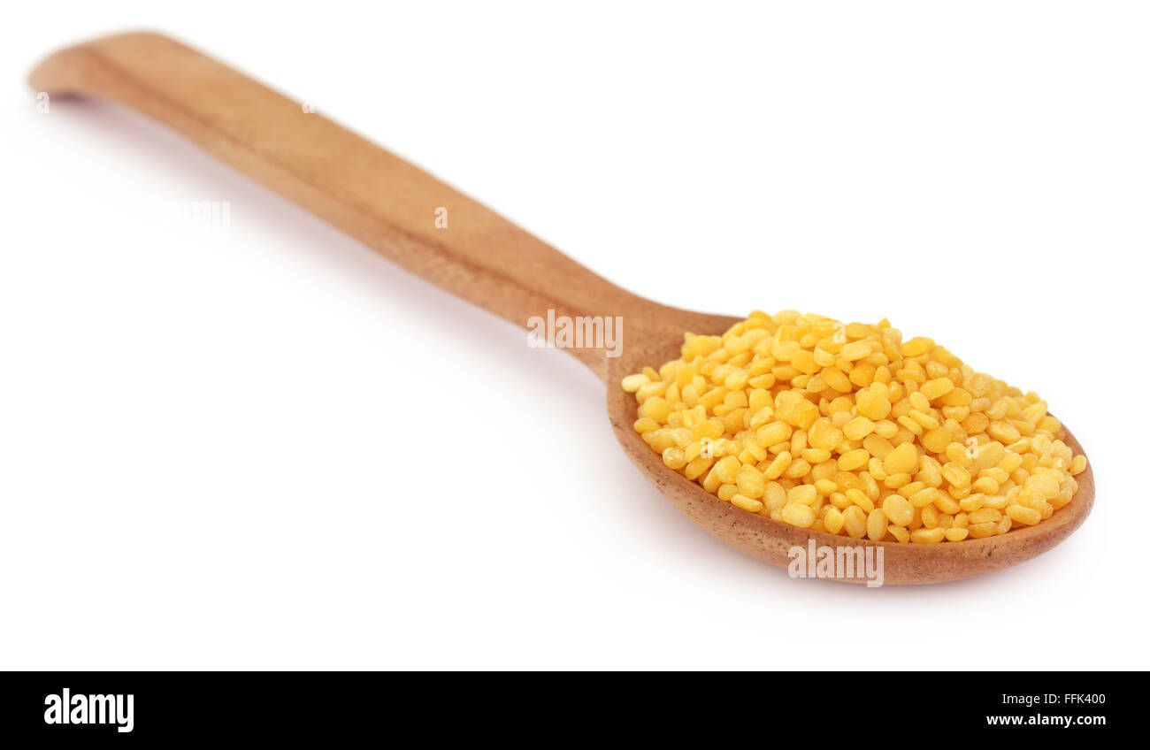 Mung dal in wooden spoon with selective focus Stock Photo