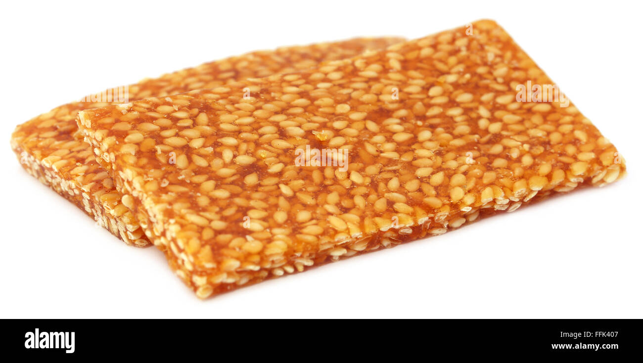 Jaggery sesame Candy over white background Stock Photo