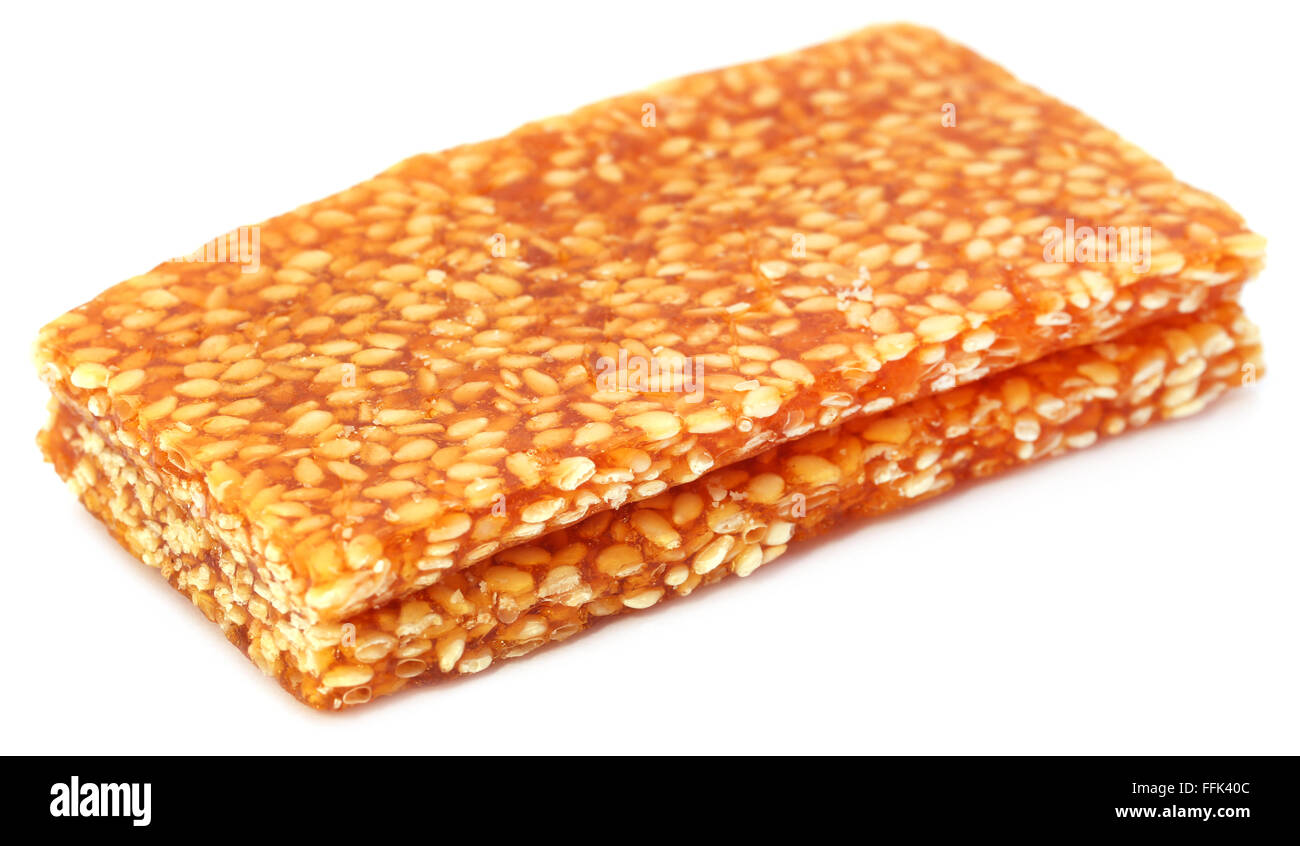 Jaggery sesame Candy over white background Stock Photo