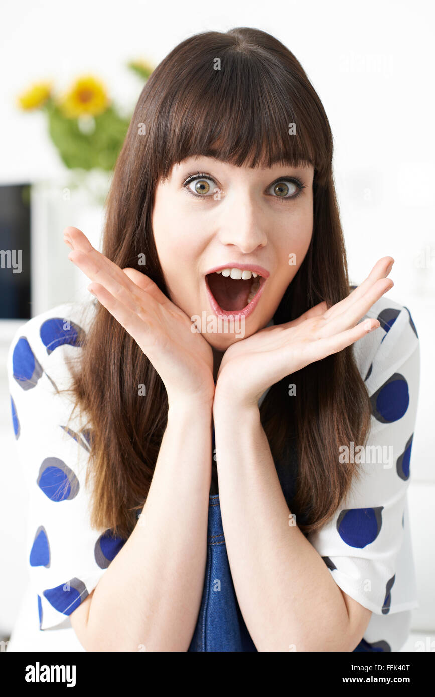 Portrait Of Female Vlogger With Excited Expression Stock Photo