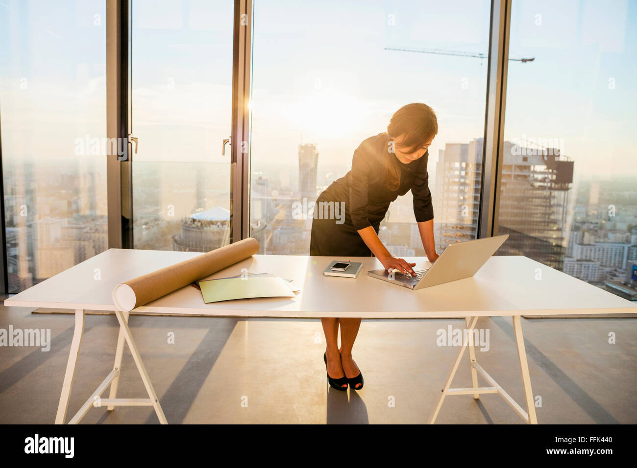 Person on laptop in office hi-res stock photography and images - Alamy