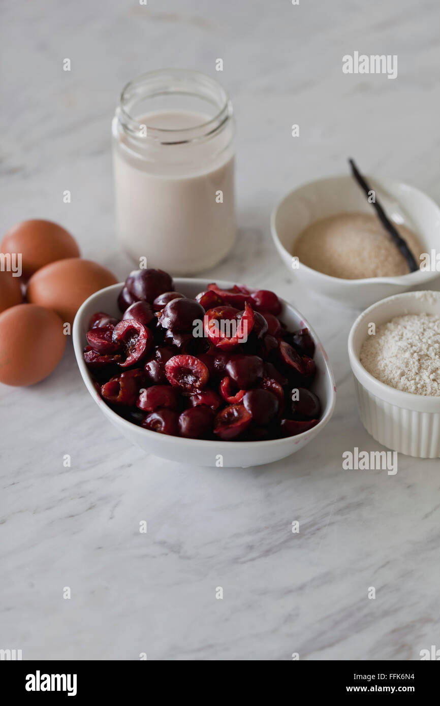 Ingredients for baking cherry clafoutis Stock Photo