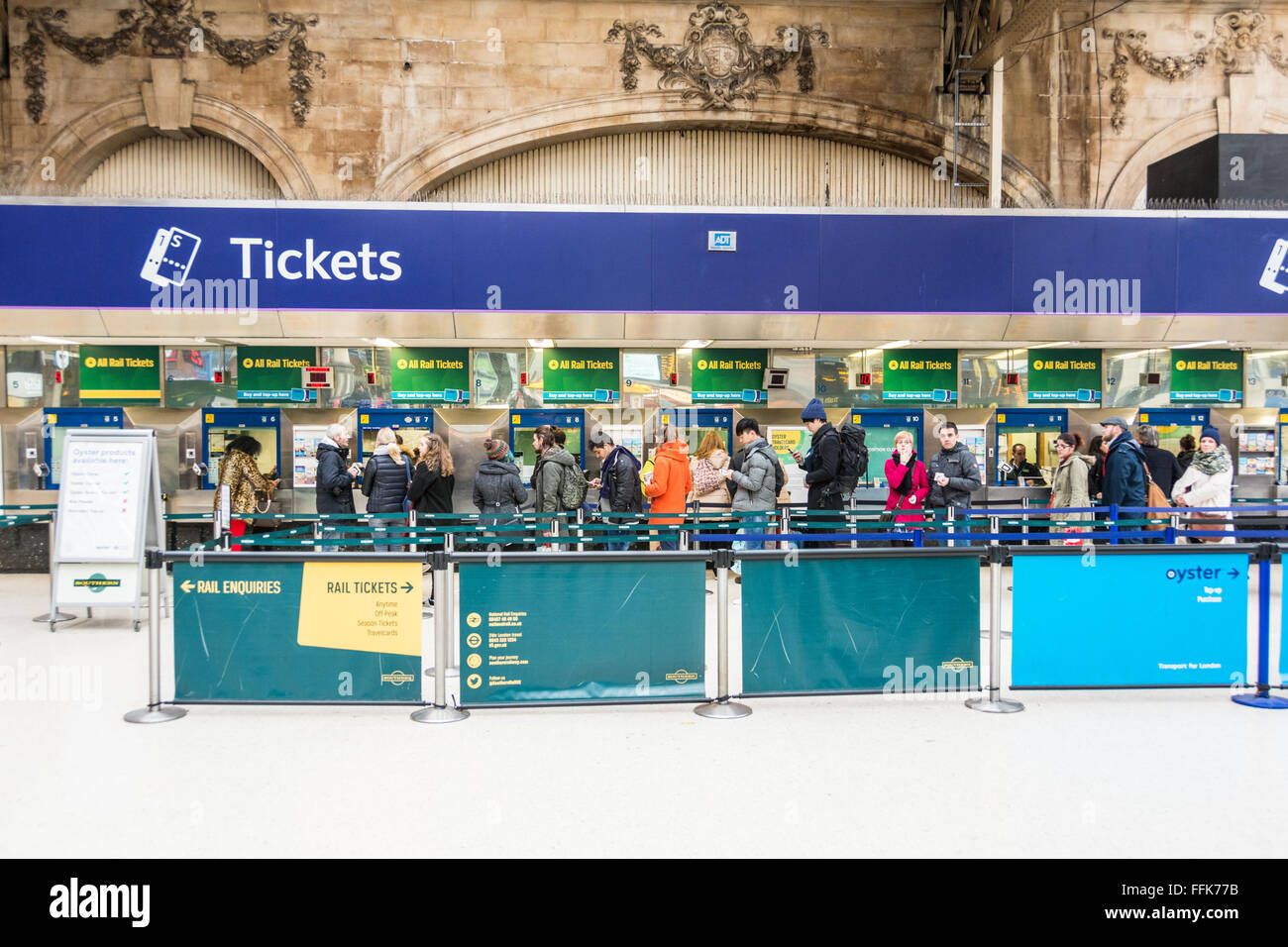 Busy ticket office at London Victoria station, a central London railway
