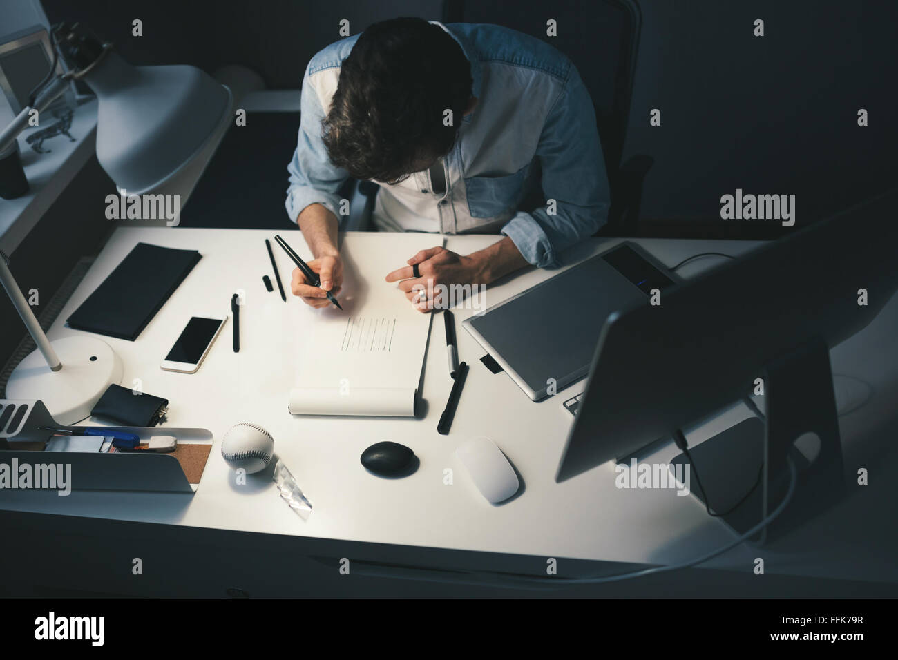 Designer at work in office Stock Photo
