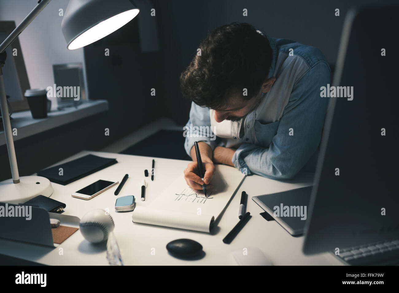 Designer at work in office Stock Photo