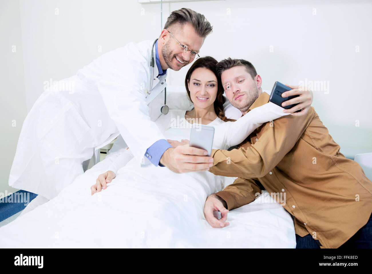 Doctor and female patient making selfies Stock Photo