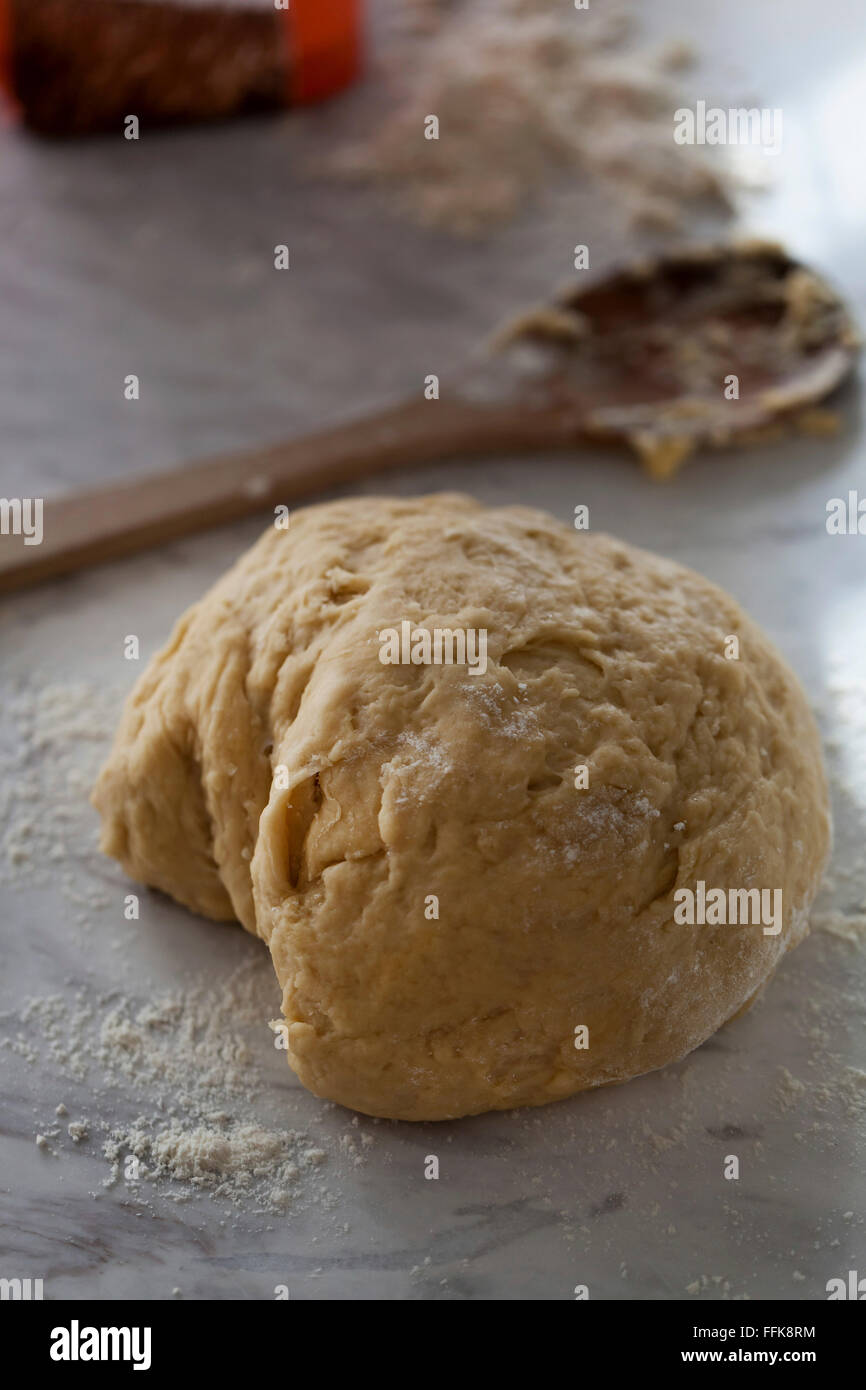 Bread dough on a white marble surface Stock Photo