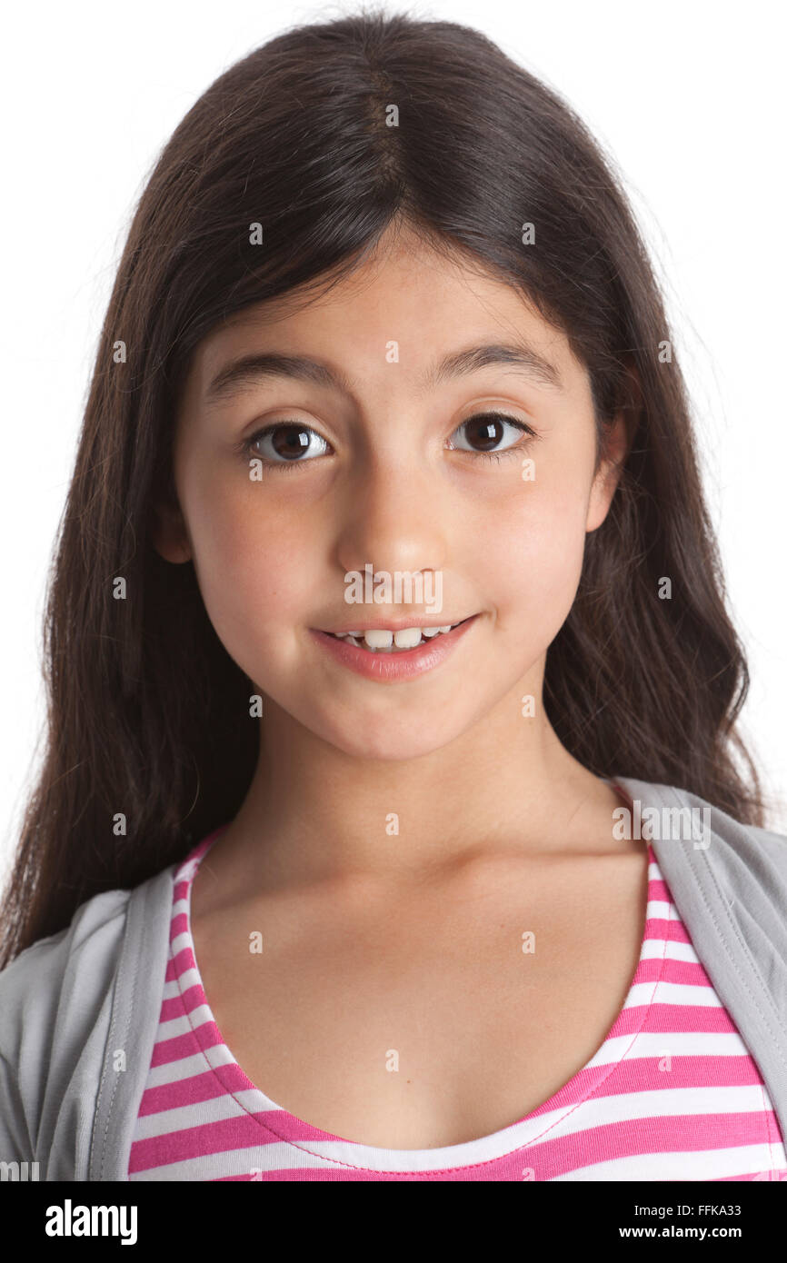 Portrait of an eight year old girl on white background Stock Photo