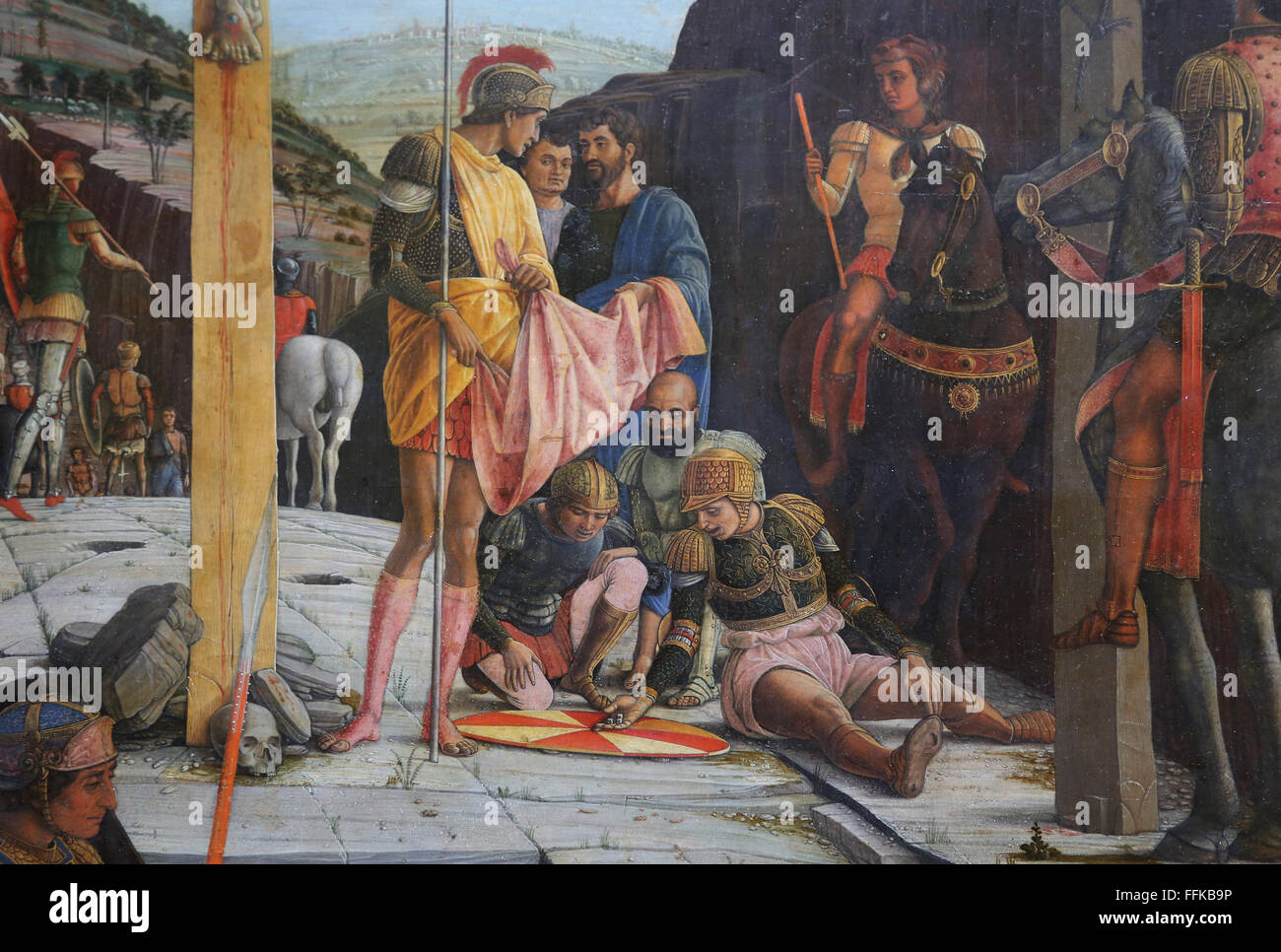 The Crucifixion. Central part of the predella. 1457-1405. By Andrea Mantegna (1431-1506). Soldiers playing dice Jesus' Tunic