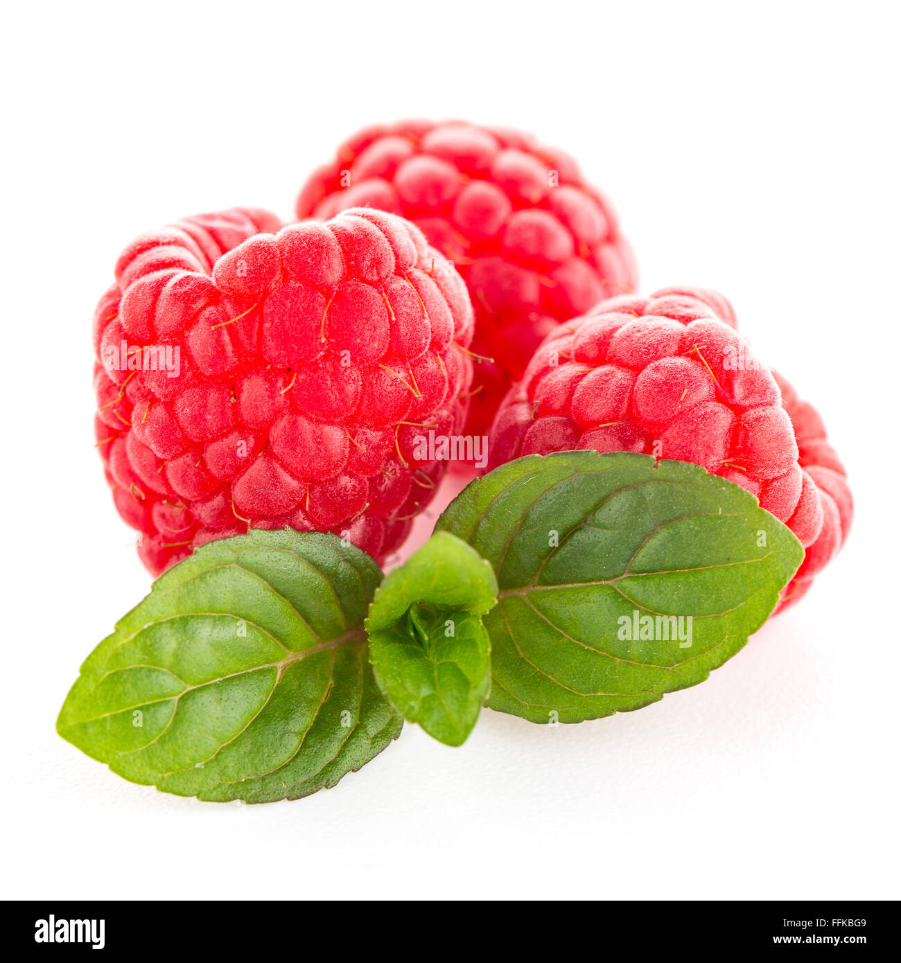 Raspberries with leaves isolated on white background Stock Photo - Alamy