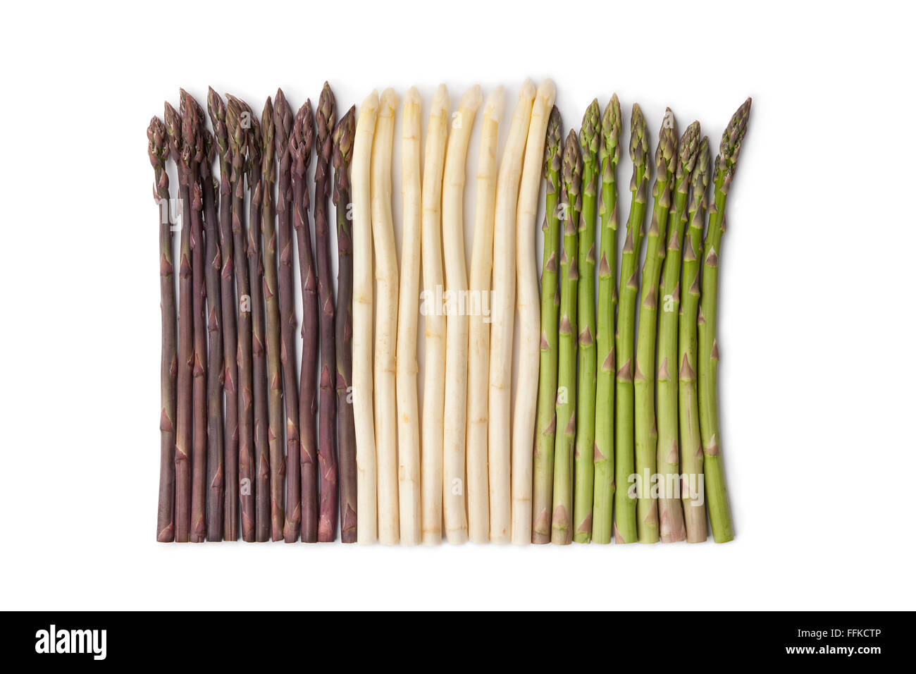 Fresh purple, white and green asparagus on white background Stock Photo