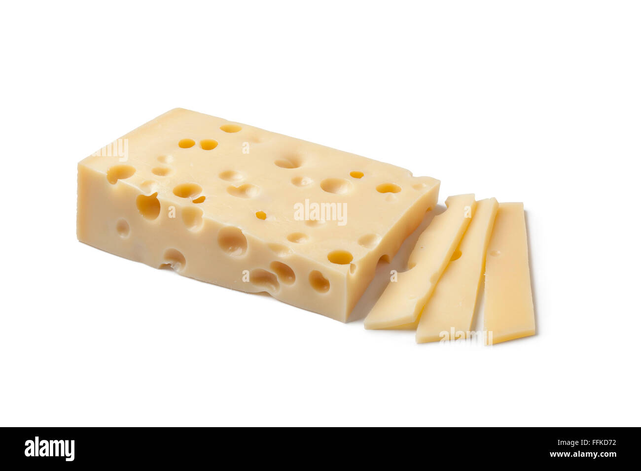 Piece of Swiss Emmentaler cheese and slices on white background Stock