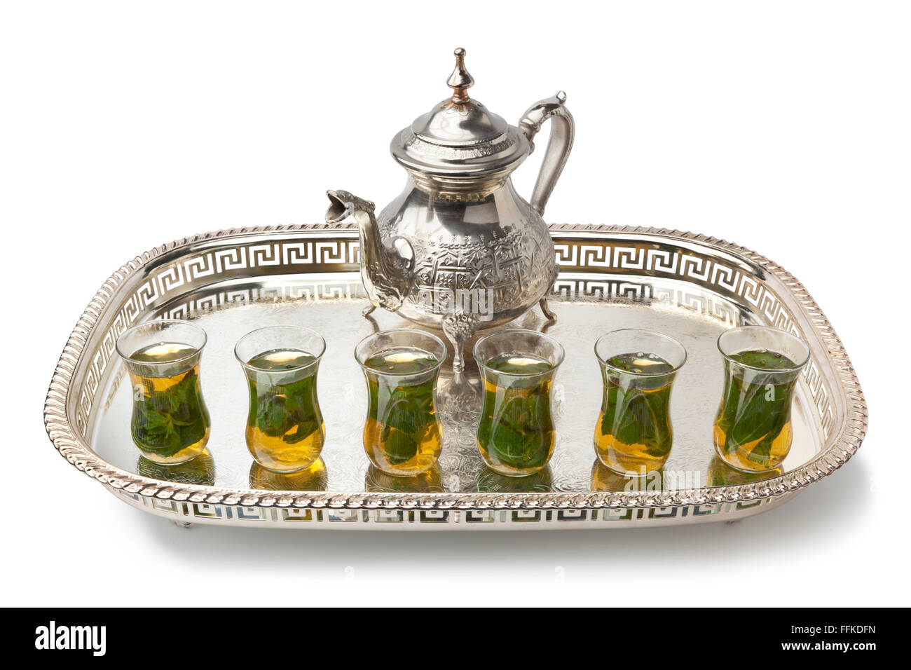 Tray with traditional Moroccan mint tea on white background Stock Photo