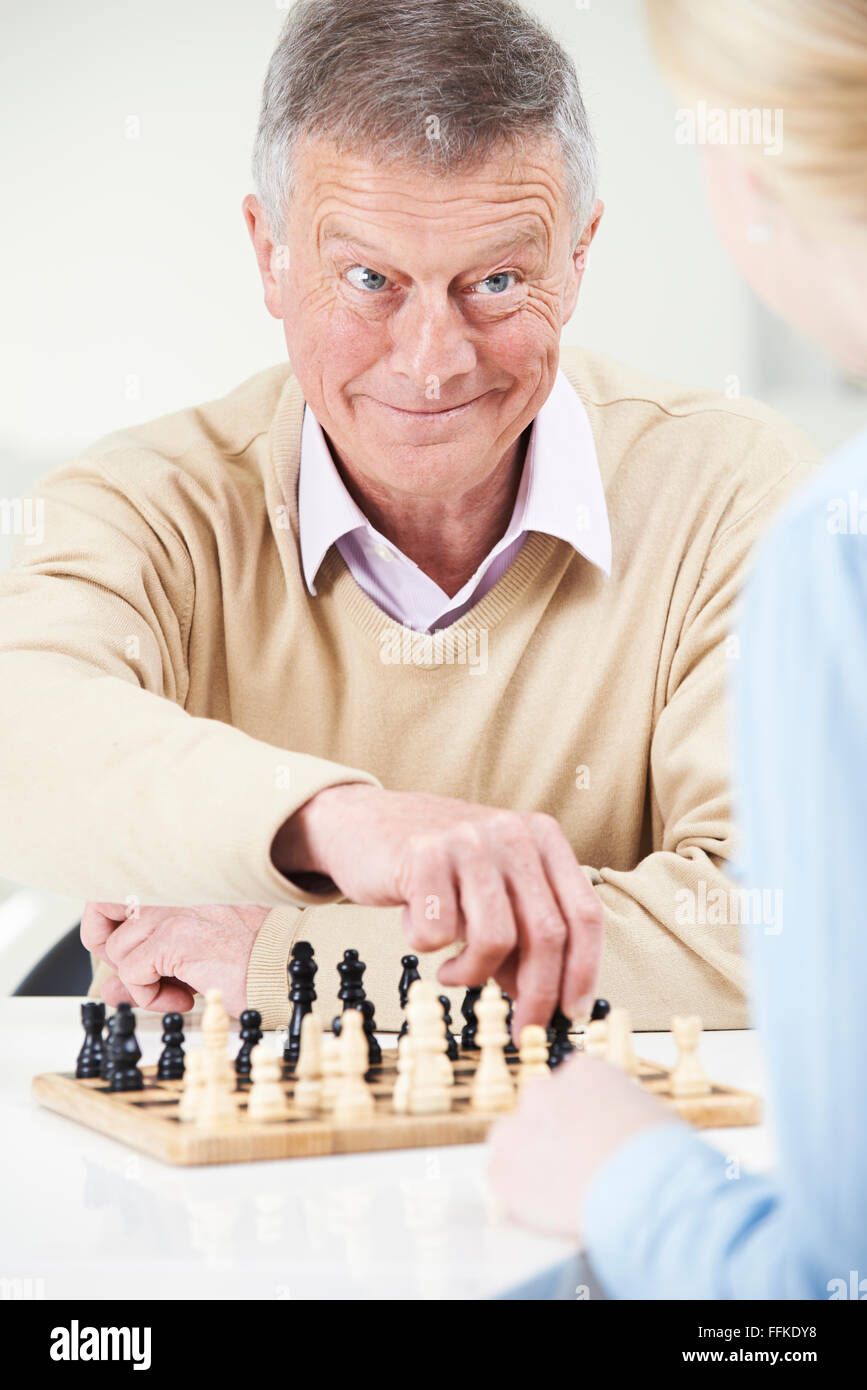 People Playing Chess in Retirement Home Stock Image - Image of senior,  people: 231334643