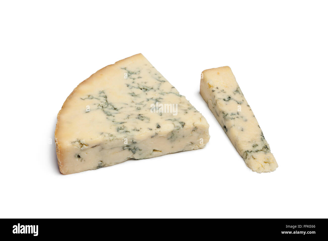 Wedge of Blue Stilton cheese on white background Stock Photo