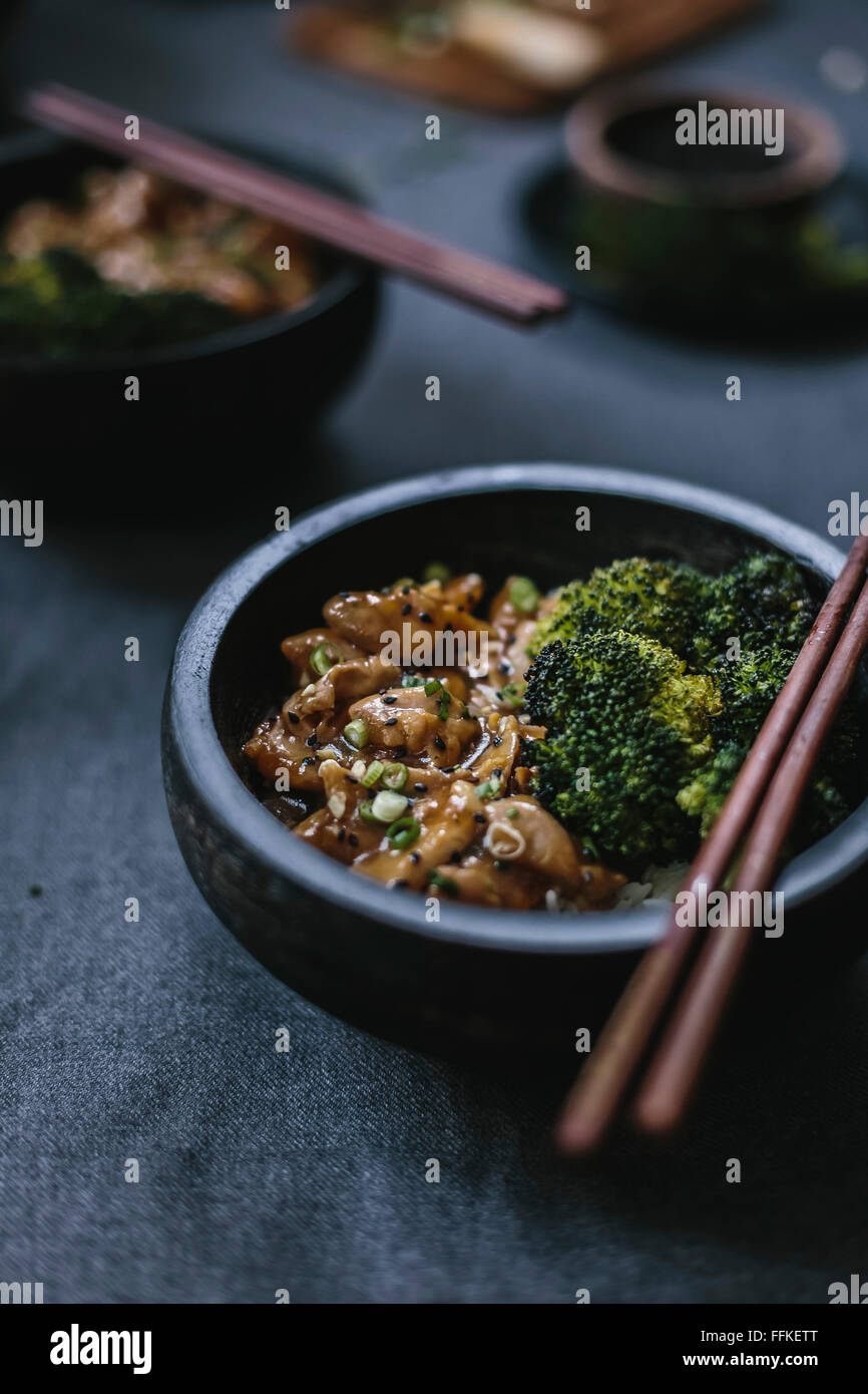 Chicken stir fry with roasted broccoli Stock Photo Alamy