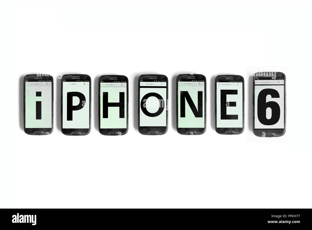 iPhone6 written on smartphone screens photographed against a white background. Stock Photo