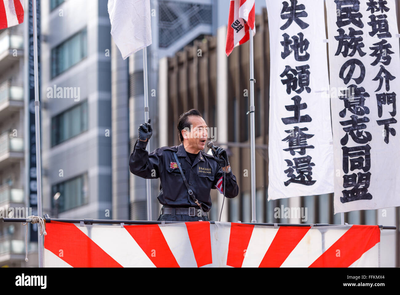 A right wing speaker gives a public speech in the Asakusa district of Tokyo, Japan. Stock Photo