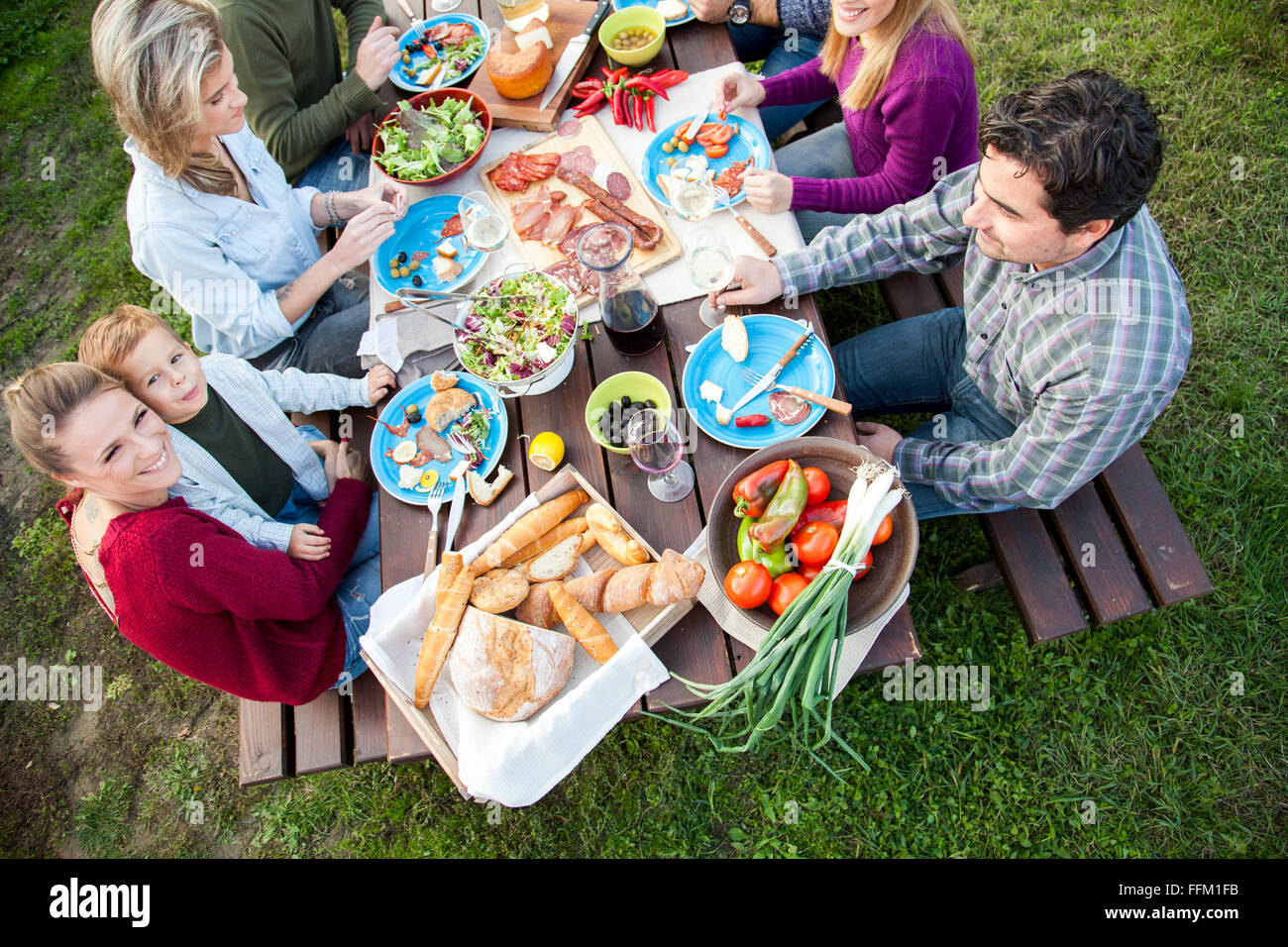 Group of friends celebrating together on garden party Stock Photo