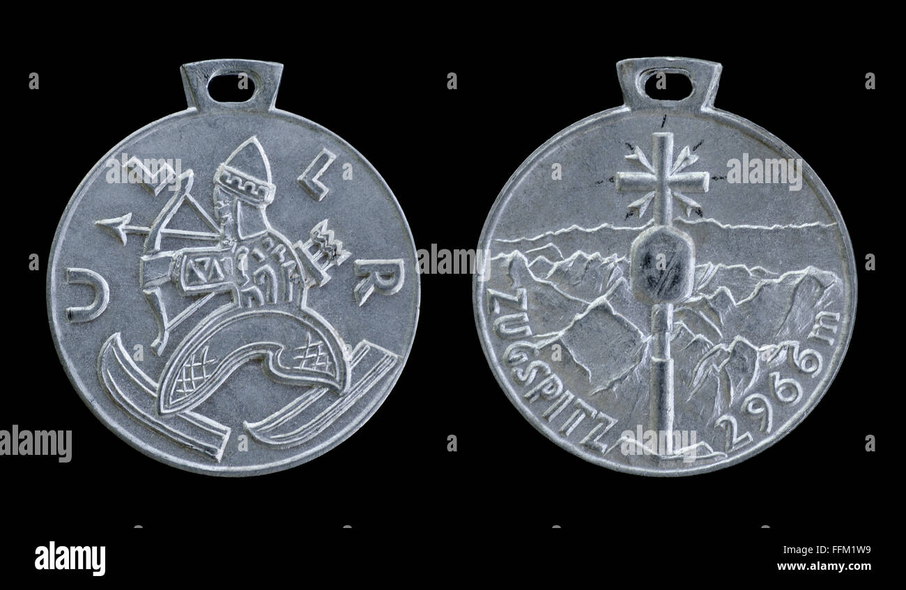 A 1930s cast alloy medallion souvenir of Zugspitze mountain with Norse God Ullr on reverse Stock Photo