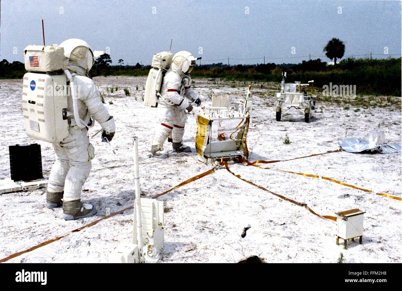 NASA Apollo 14 astronauts Alan B. Shepard Jr. (right), commander, and Edgar D. Mitchell, lunar module pilot, during lunar surface simulation training at the Kennedy Space Center July 18, 1970 in Cape Canaveral, Florida. Stock Photo