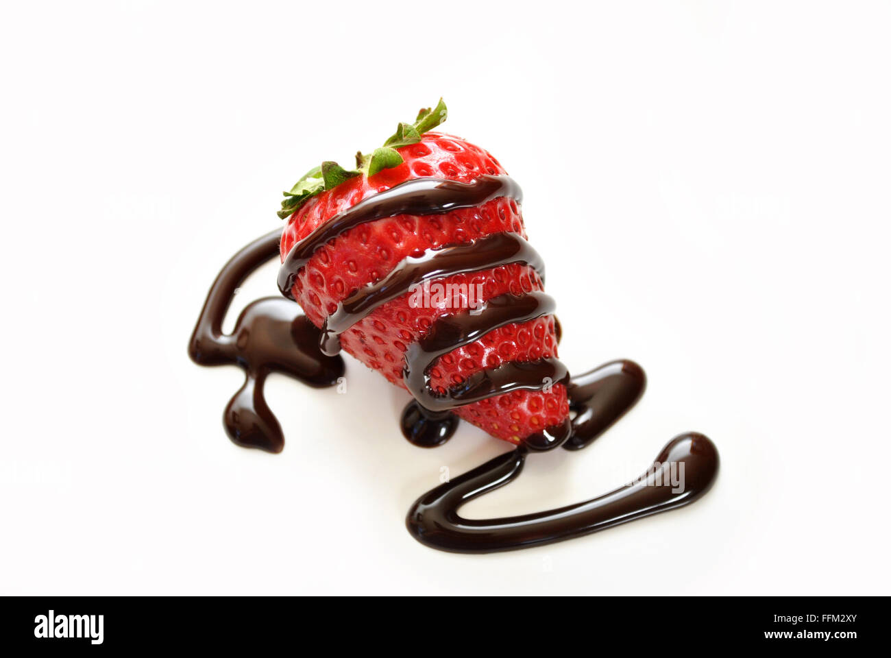 Fresh Strawberry Drizzled with Chocolate Sauce Stock Photo
