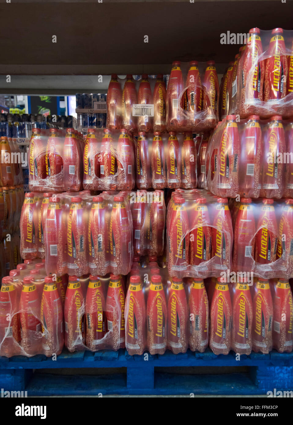 Lucozade energy drinks for sale in a warehouse. Stock Photo