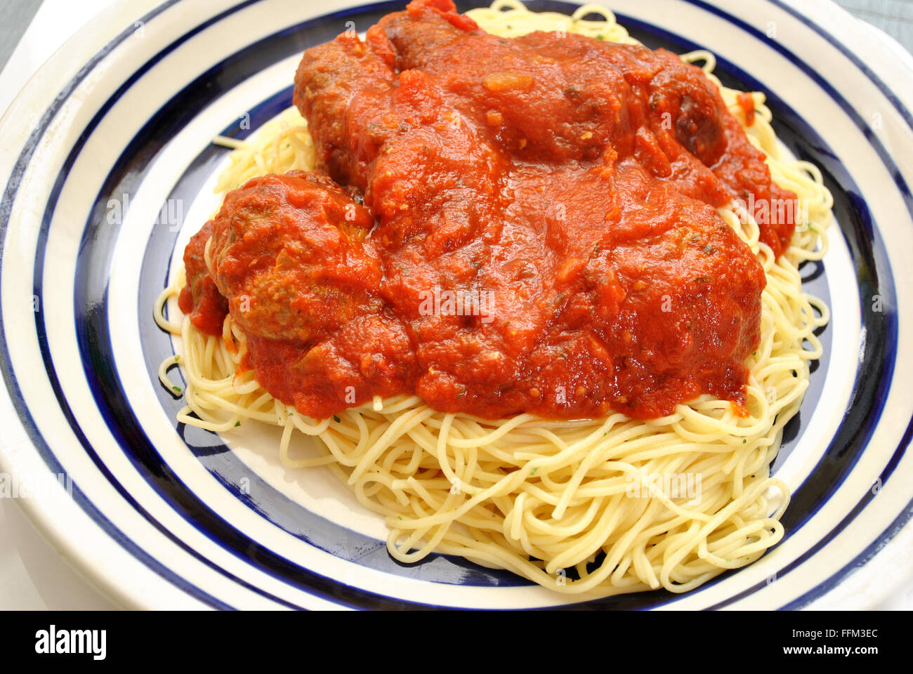 Angel Hair Pasta with Meatballs and Tomato Sauce Stock Photo