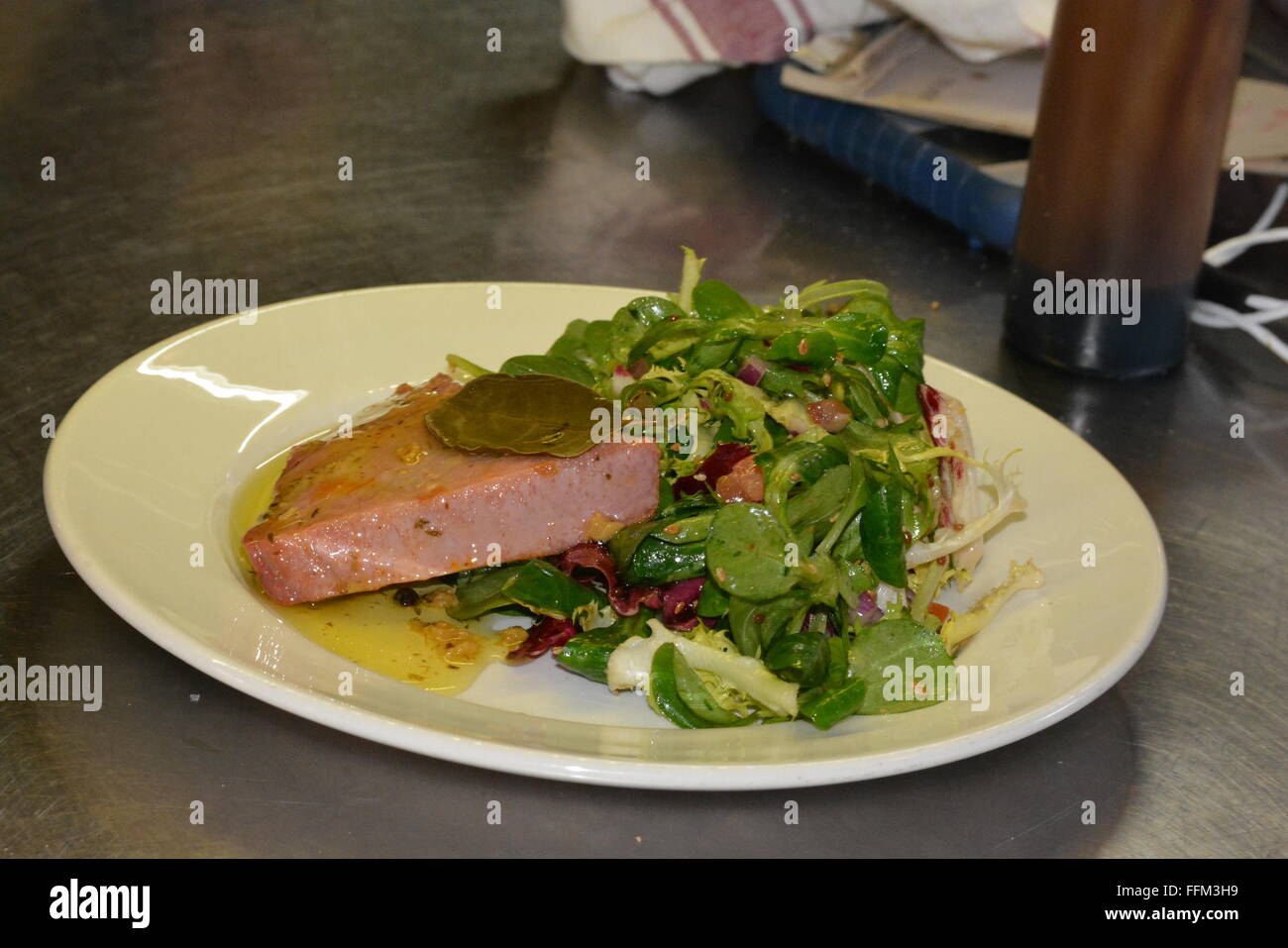 Owner prepares food at Sanpa Tapas Bar & Restaurant in Wokingham, town centre. Berkshire, UK. Charles Dye / Alamy Live News Stock Photo