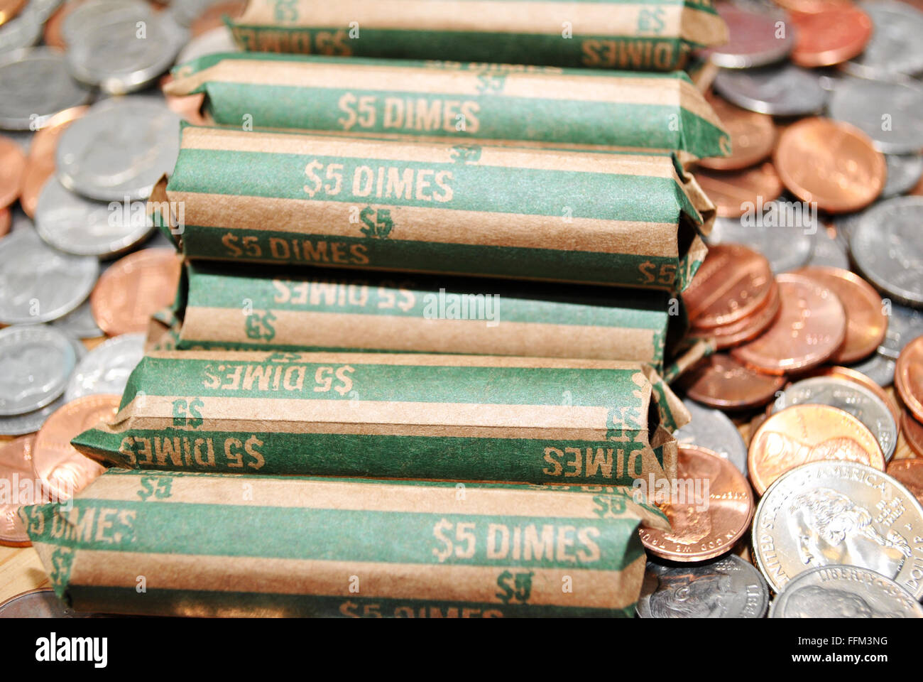 Rolled Bank American Dimes on Mixed Coinage Stock Photo