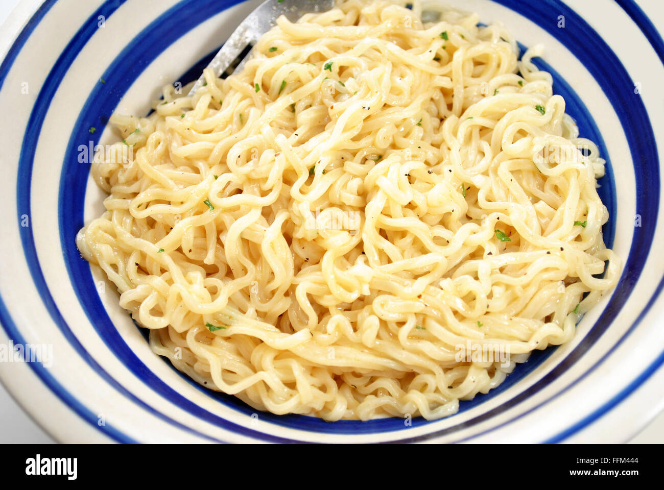Plain Ramen Noodles with Butter and Herbs Stock Photo Alamy