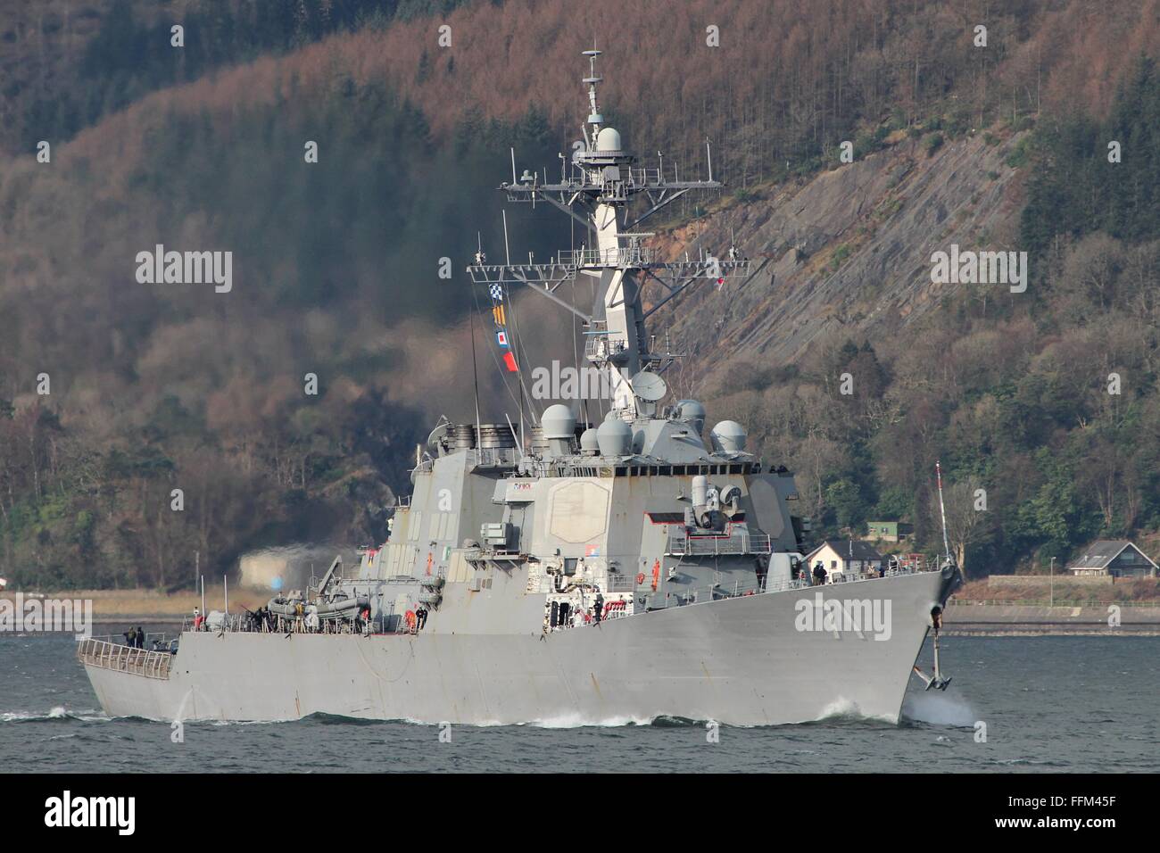 USS Ross (DDG-71), an Arleigh Burke-class destroyer of the US Navy, passes Gourock on arrival for Exercise Joint Warrior 14-1. Stock Photo