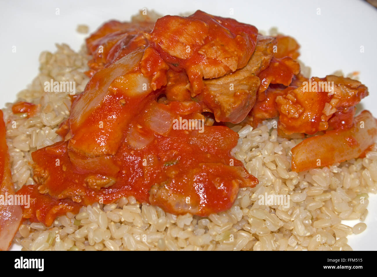 pork,brown rice, stir fry, tomato, gourmet Stock Photo