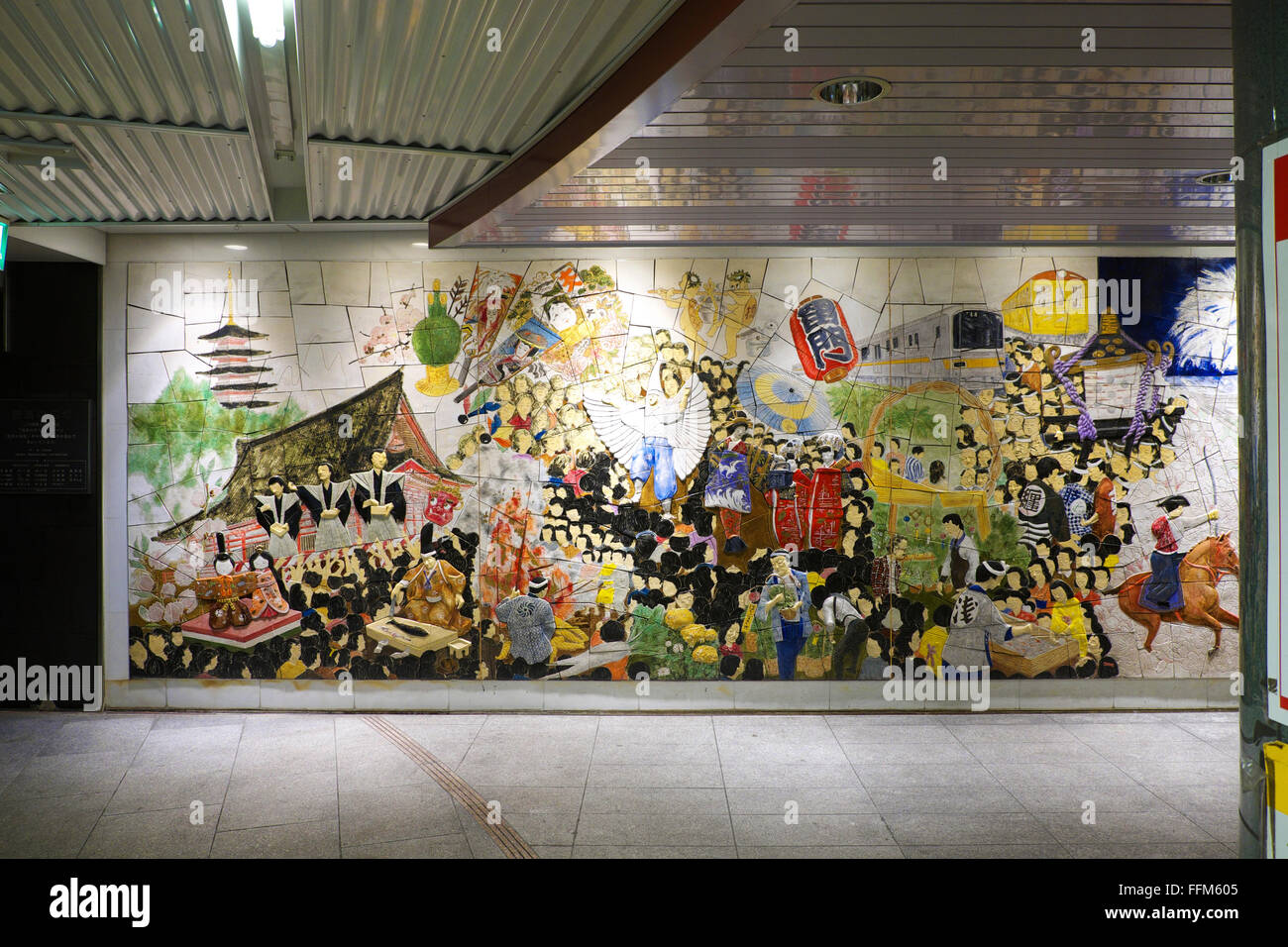 Colourful Japanese mural on the wall in Asakusa Subway Station, Tokyo