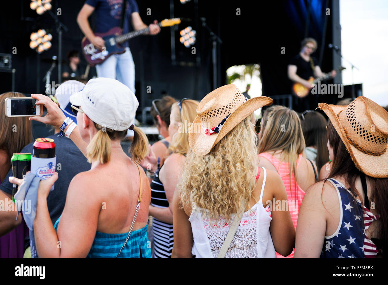 Concert goer's from behind at the Carolina Country Music Festival in