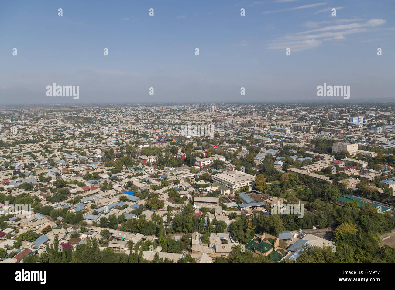 Skyline of the Kyrgyz city Osh as seen from the Sulaiman Mountain. Stock Photo