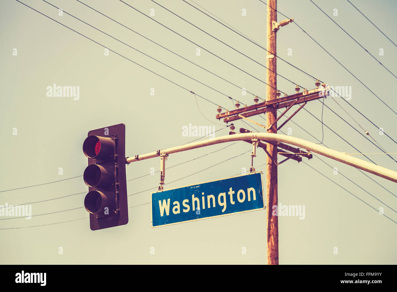 Retro stylized traffic lights and street sign, USA. Stock Photo