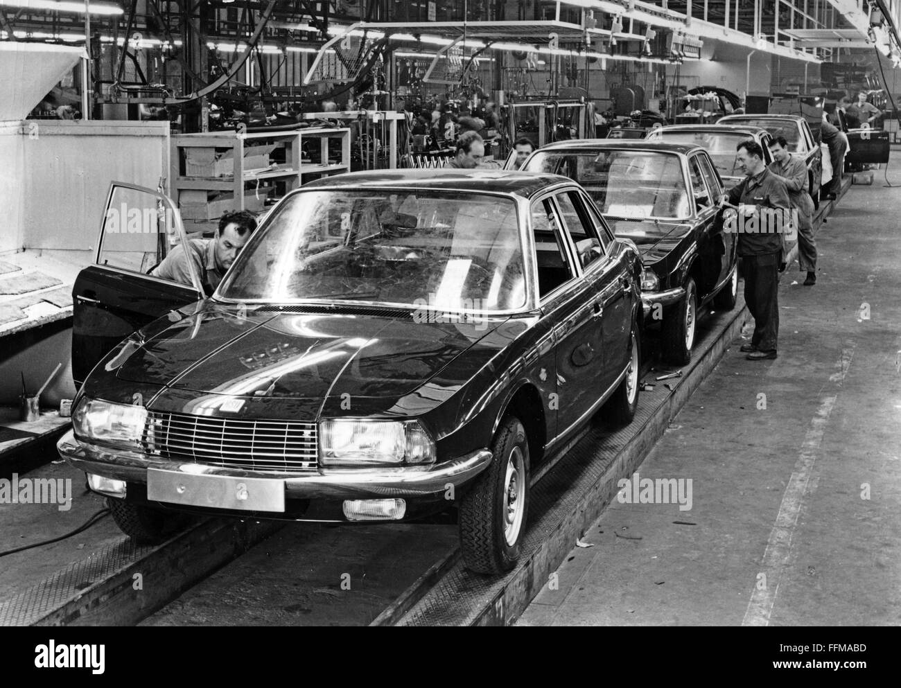 industry,car industry,production of the NSU Ro 80,Neckarsulm,1967,Germany,factory building,factory buildings,manufactory,manufactories,hall,halls,assembly line,production line,assembly lines,production lines,limousine,worker,workers,works,working,work,labouring,laboring,labour,labor,Wankel engine,Wankel rotary engine,Wankel engines,Wankel rotary engines,Wankel,Ro80,fabrication,building,production,manufacture,foundry,production plant,manufacturing plant,factories,foundries,production plants,manufacturing plants,company,,Additional-Rights-Clearences-Not Available Stock Photo