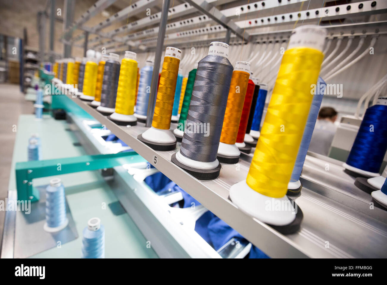 colourful cotton reels in an English factory Stock Photo