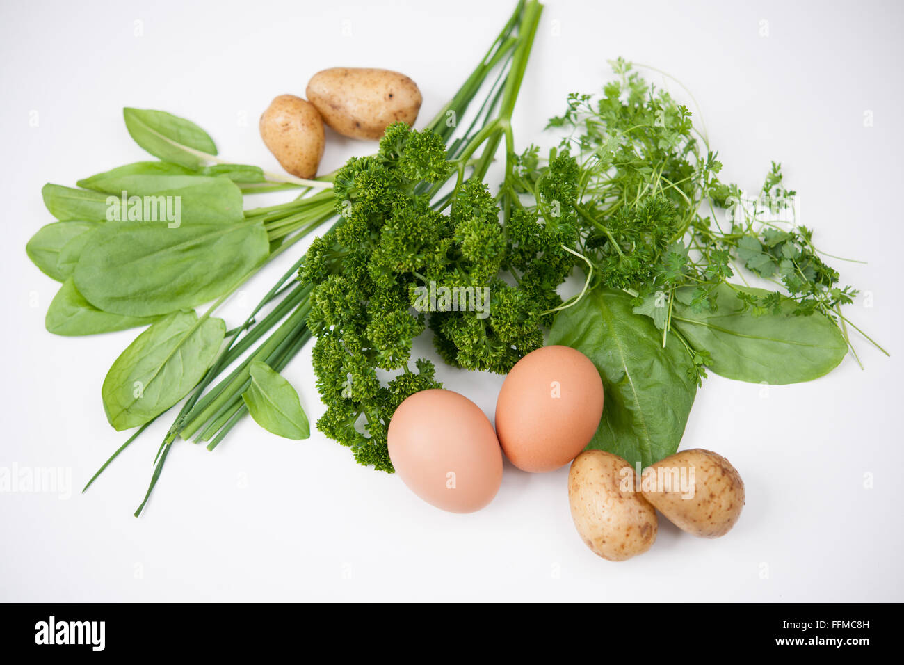 Picture of 'Frankfurter Grüne Soße', taken on 15/02/2016 in Oberursel. 'Grüne Soße' is a traditional Food from Frankfurt, containing parsley, sorrel, chervil, borage, burnet and cress. It s traditionally served with potatoes ans boiled eggs. Stock Photo