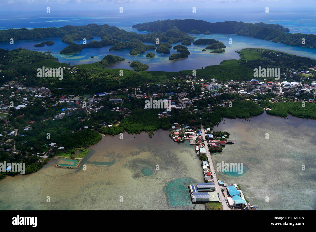 Aerial view of Koror, city in Palau, Micronesia, Oceania. Pacific Ocean island seen from sky on airplane. Plane flying over sea, nature, atoll Stock Photo