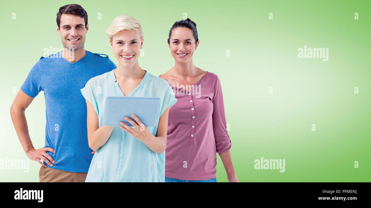 Composite image of group of three persons using tablet Stock Photo