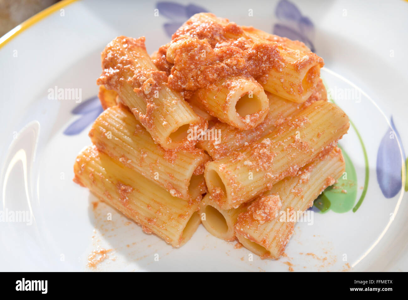 rigatoni with tomato sauce and ricotta cheese Stock Photo