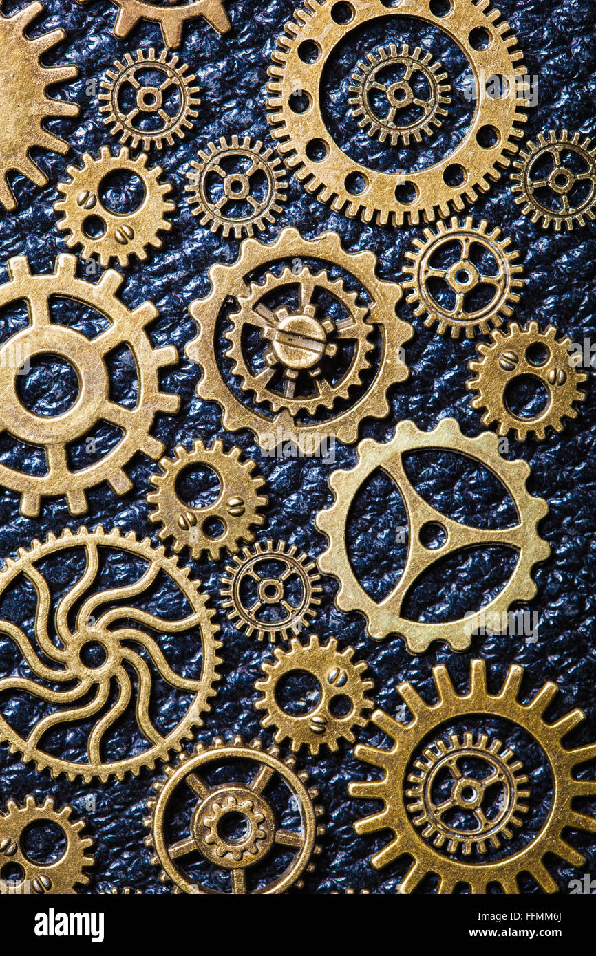 steampunk mechanical cogs gears wheels on leathern background Stock ...