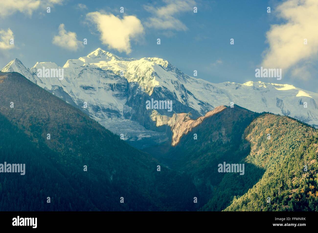 Mountain top covered with clouds Stock Photo - Alamy
