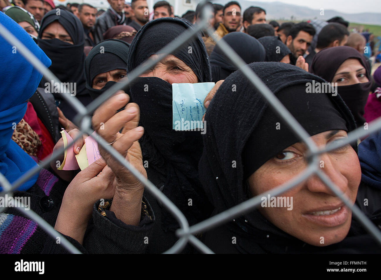 blanket distribution by a Muslim NGO to refugees in Ashdi refugee camp