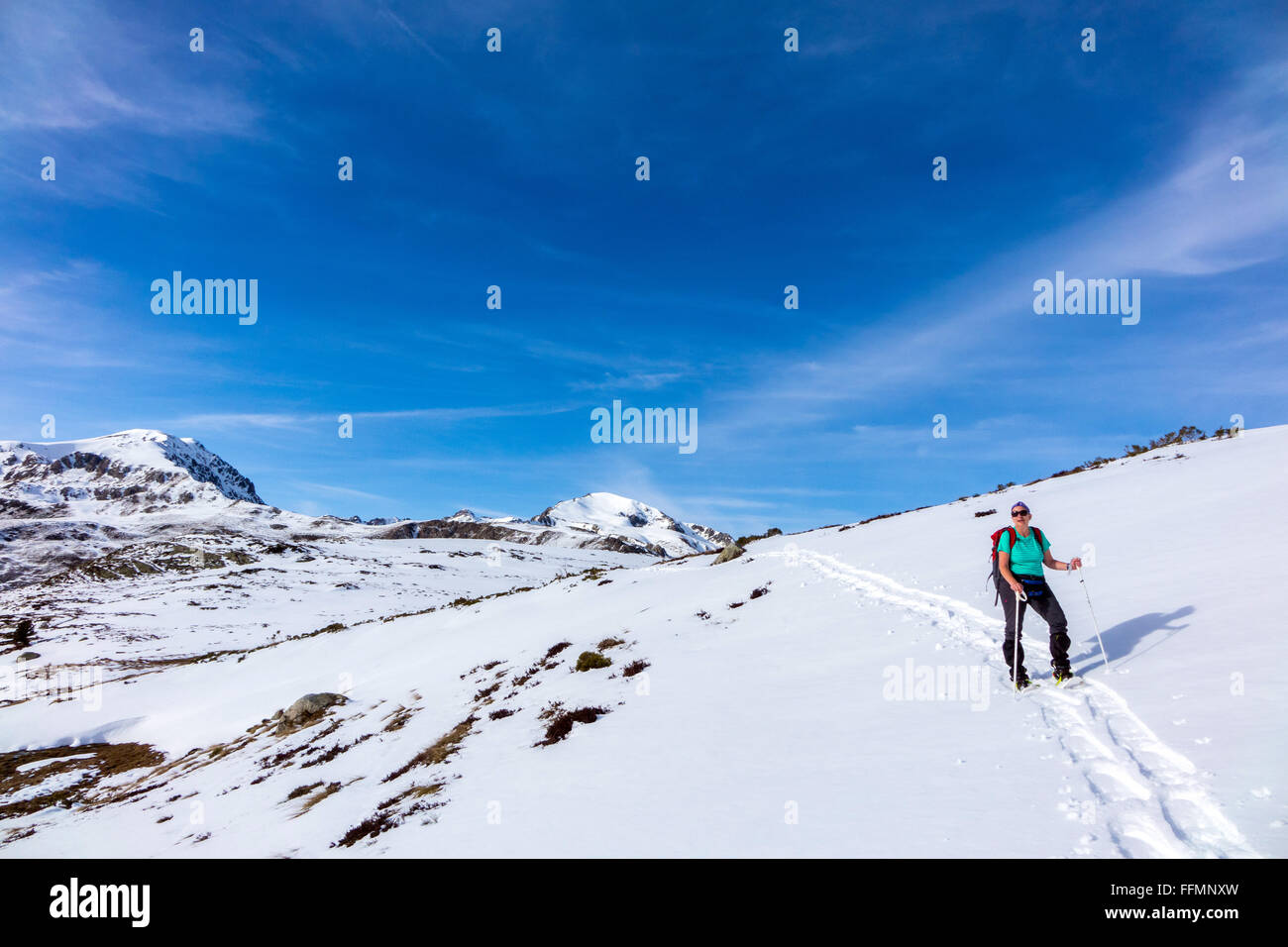 Female 50-60 snowshoeing winter French Pyrenees Stock Photo