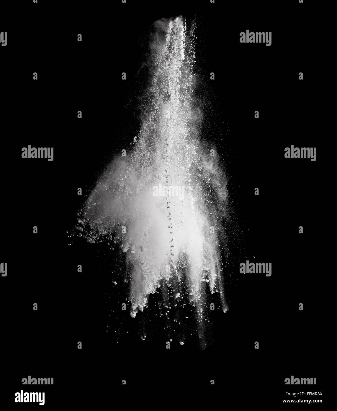 White powder explosion isolated on black background Stock Photo - Alamy