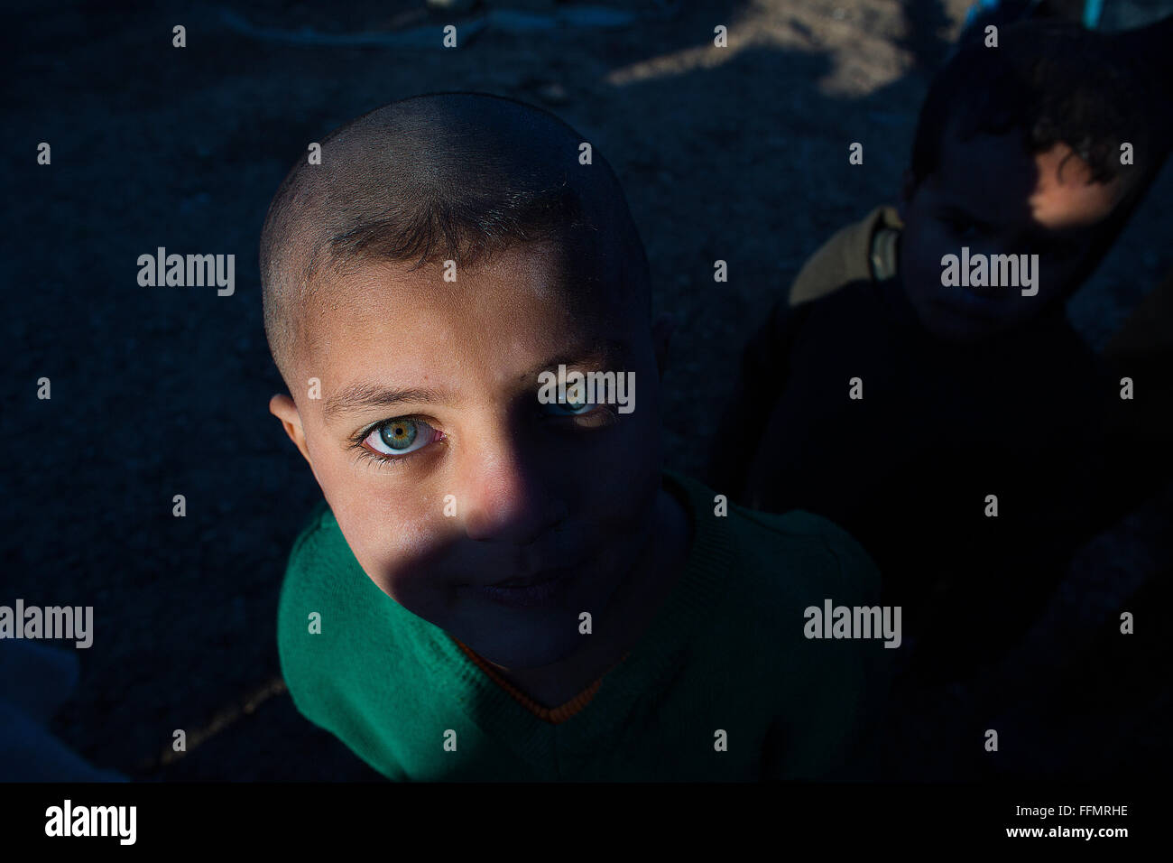 Refugee child in a refugee camp in Northern Iraq Stock Photo