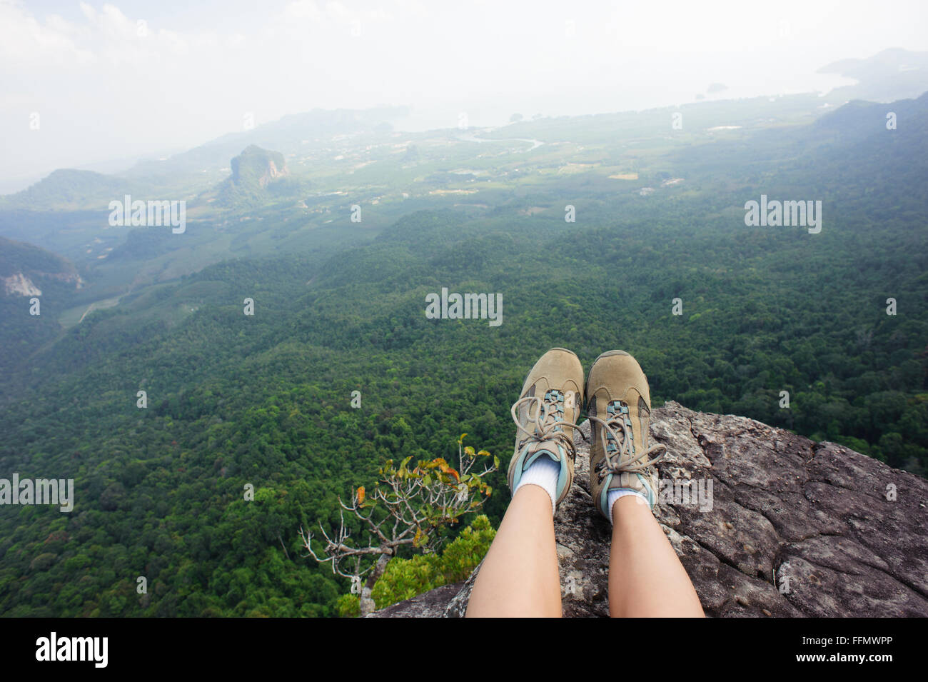 young hiker legs hiking on mountain peak Stock Photo - Alamy